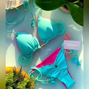 Brand new Fiorella Brazilian Swimsuit in Large. Reversible!!!!!!